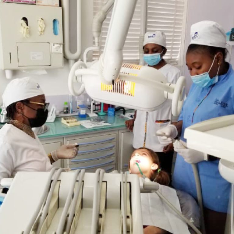 Bellevue Dental Clinic Abuja Team with a Patient